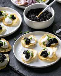 Appetizers: Caviar and Crème Fraîche with House-made Potato Chips (GF)